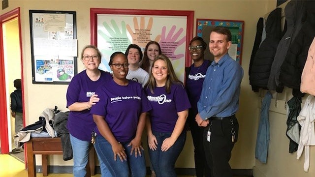 VACU's Member One division and West End center team pose for group photo