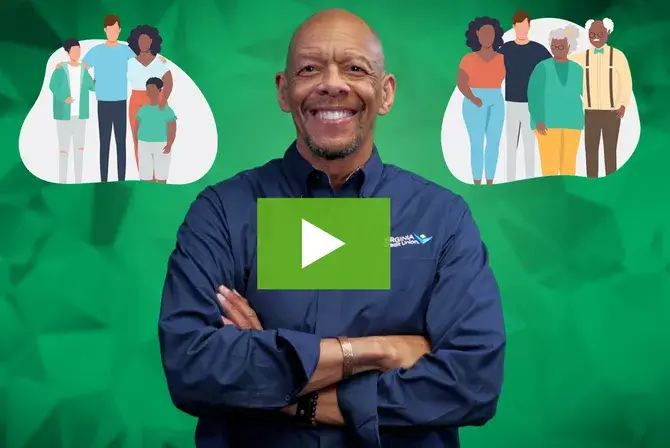 VACU Educator Chris Woodbury with arms crossed in front of a green background