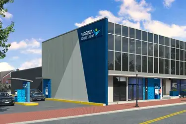 Outside, front view of new VACU Blacksburg branch with cars going through drive-thru