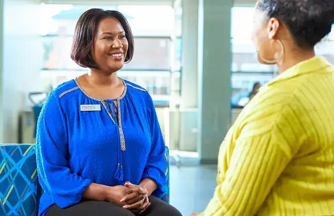 A mortgage loan officer helping a member